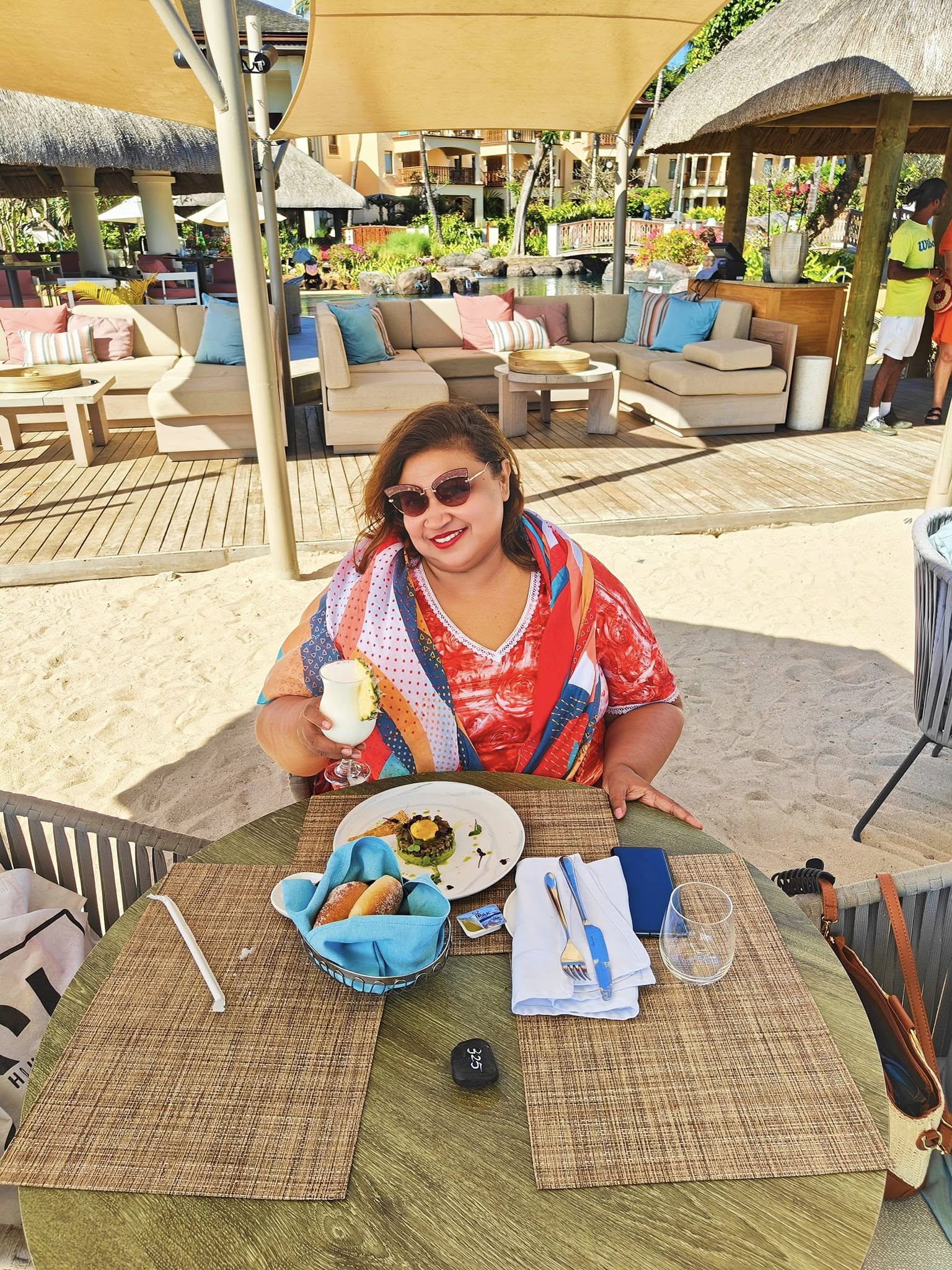 Enjoying a fresh island tuna tartare salad by the beach