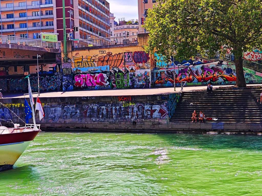 Urban artwork and graffiti along Vienna Danube Canal