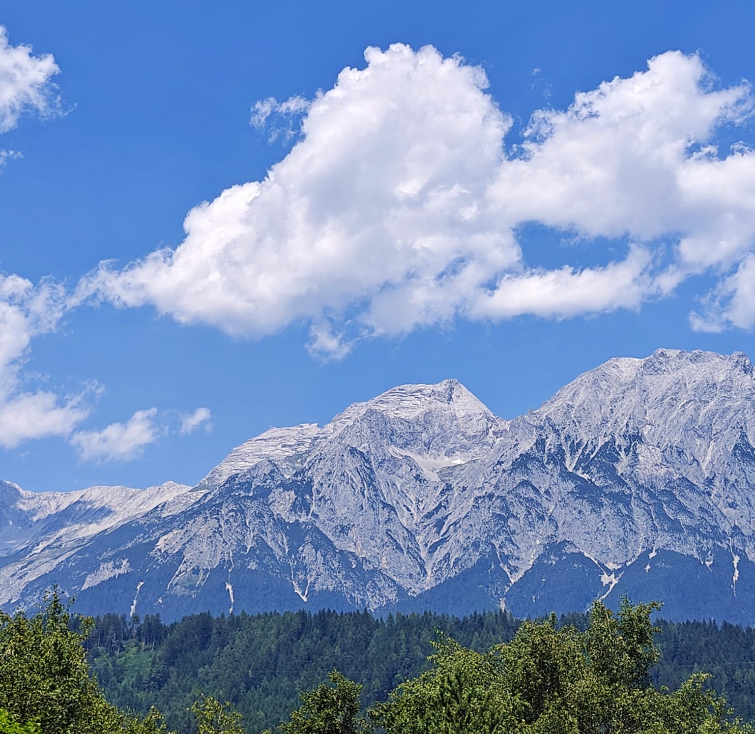 Karwendel Mountain Range towering over Innsbruck with alpine peaks