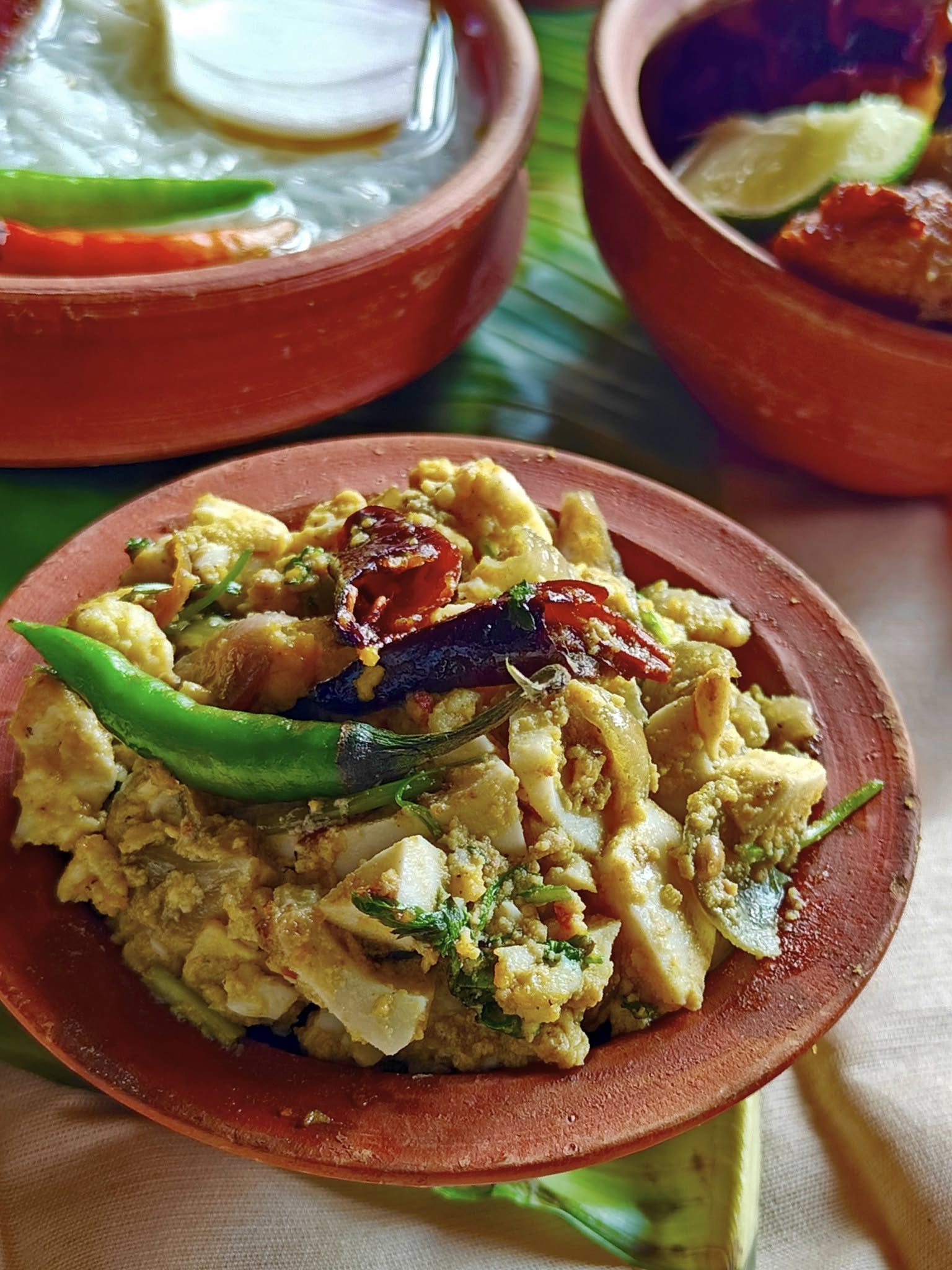 Mashed boiled eggs with mustard oil and chillies.