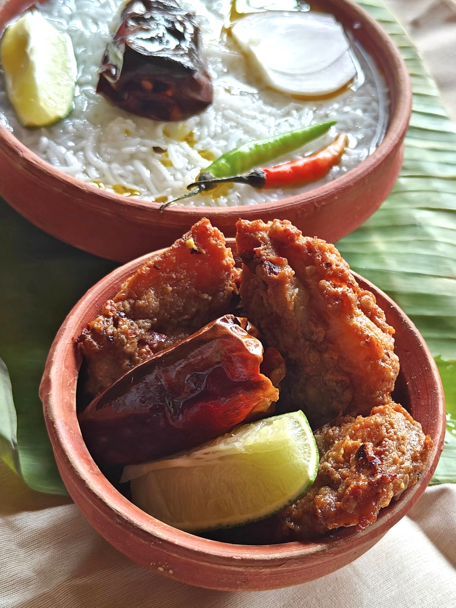 Fried fish tossed in Bengali five spices.