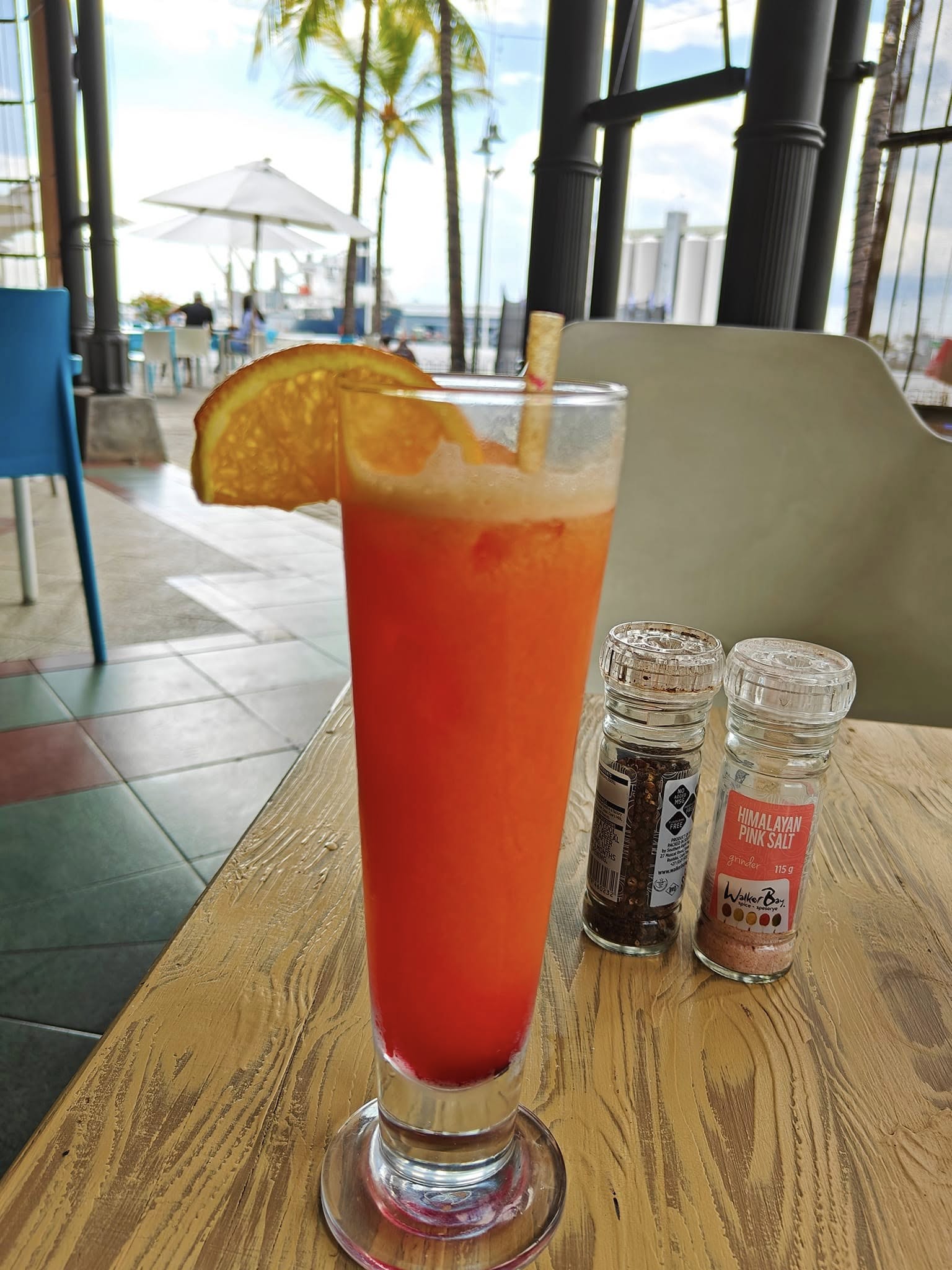 Enjoying Tequila Sunrise at Le Caudan Waterfront Mauritius.