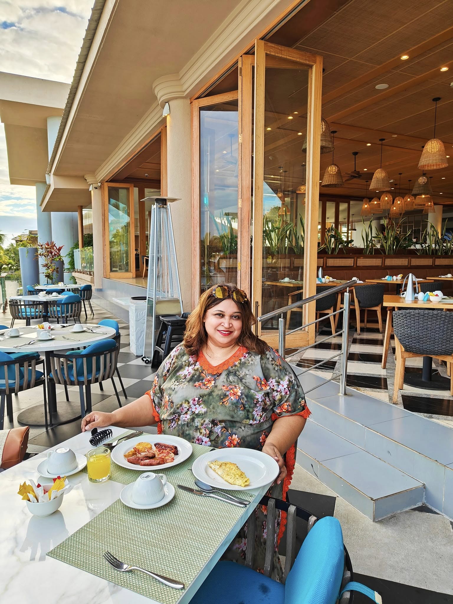 Beautifully arranged breakfast table with assorted dishes and beverages