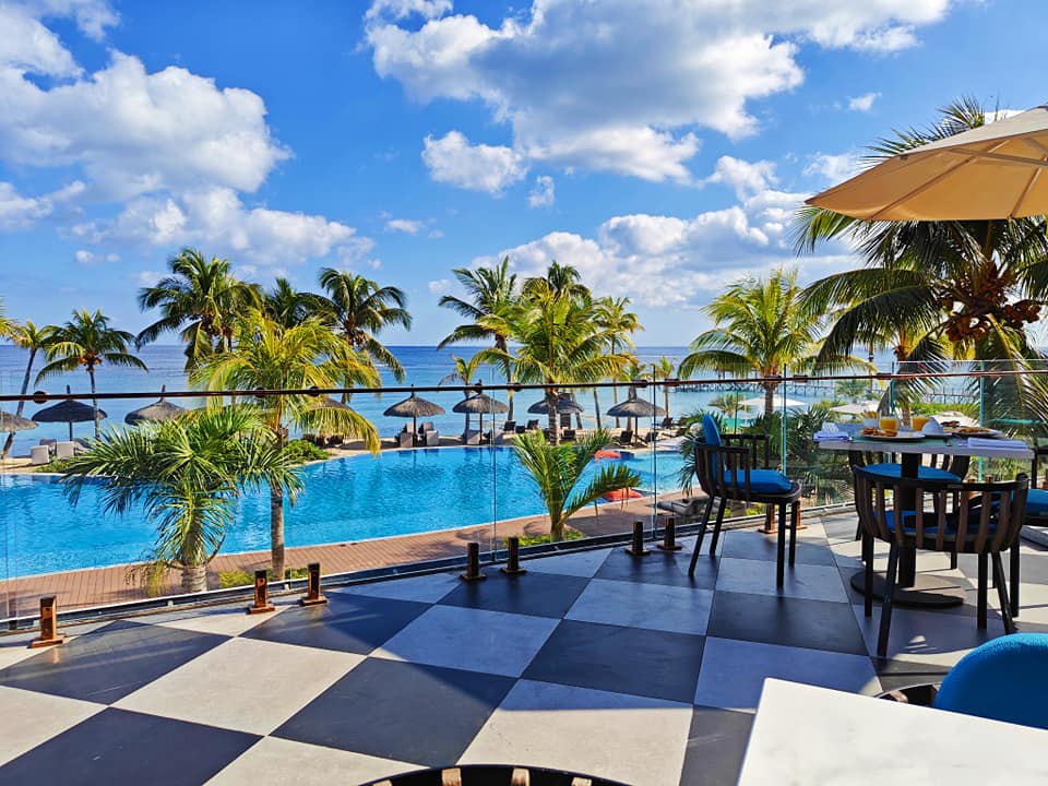 Breakfast spread with a scenic ocean view