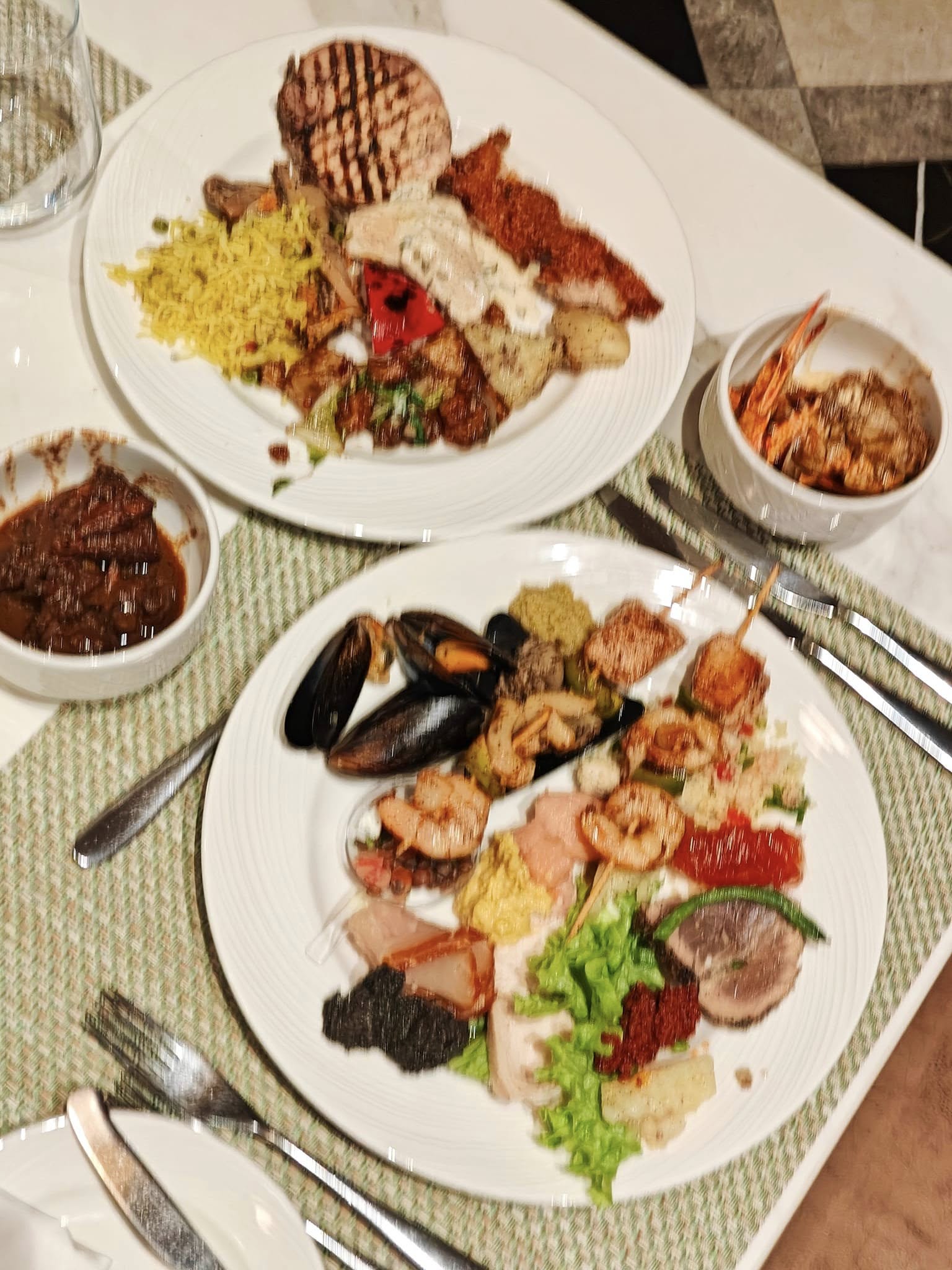 Lavish dinner spread with gourmet seafood and global flavours