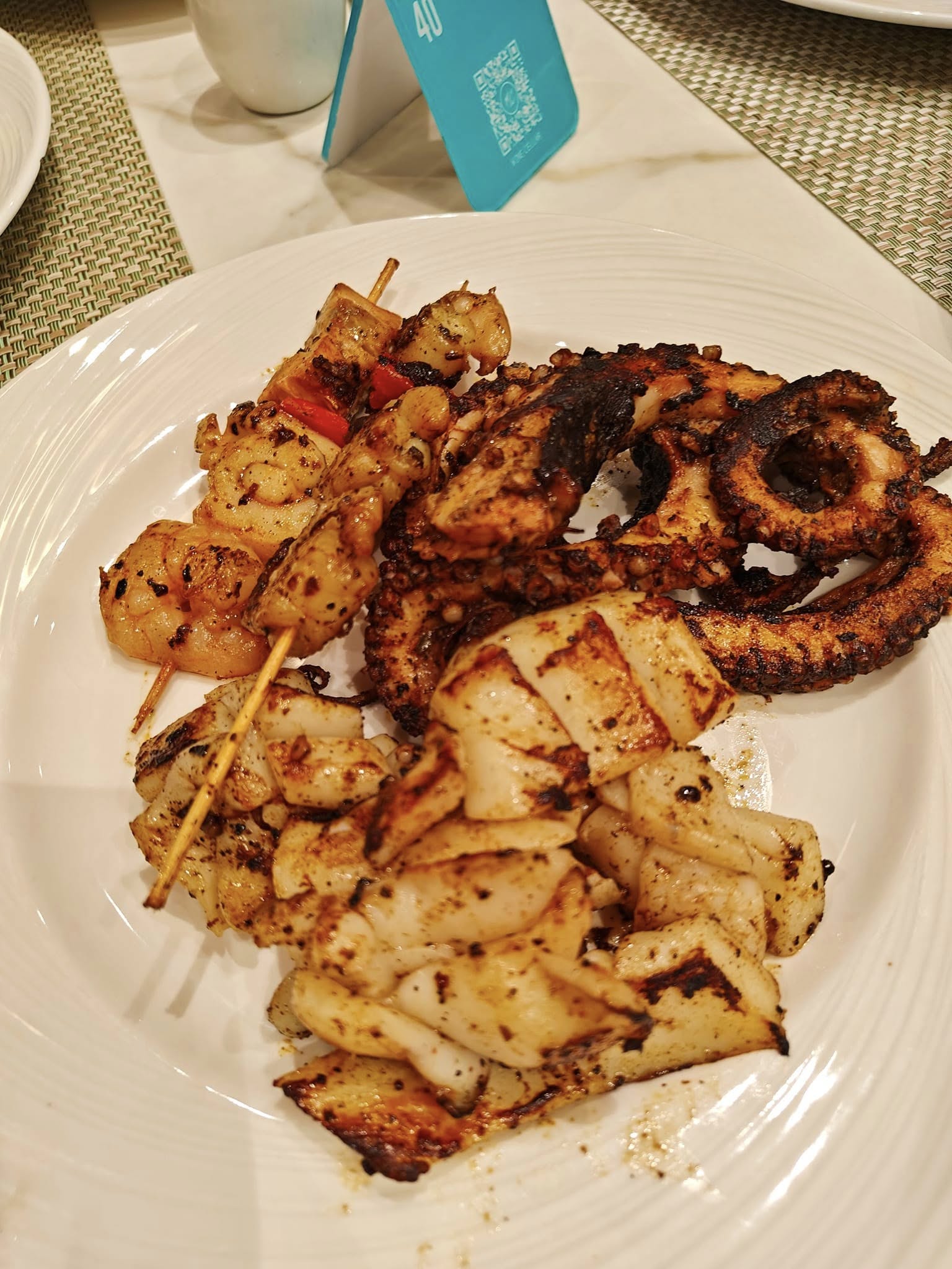 Assorted seafood grills served fresh with smoky flavours