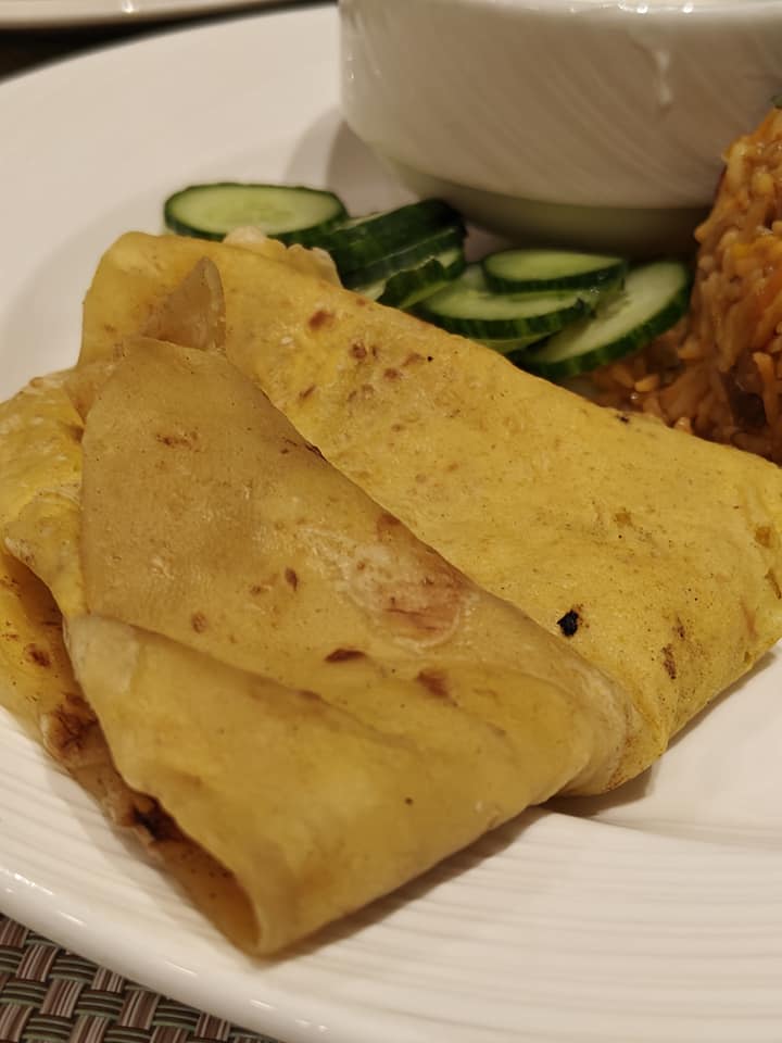 Traditional Mauritian dholpuri served with salad