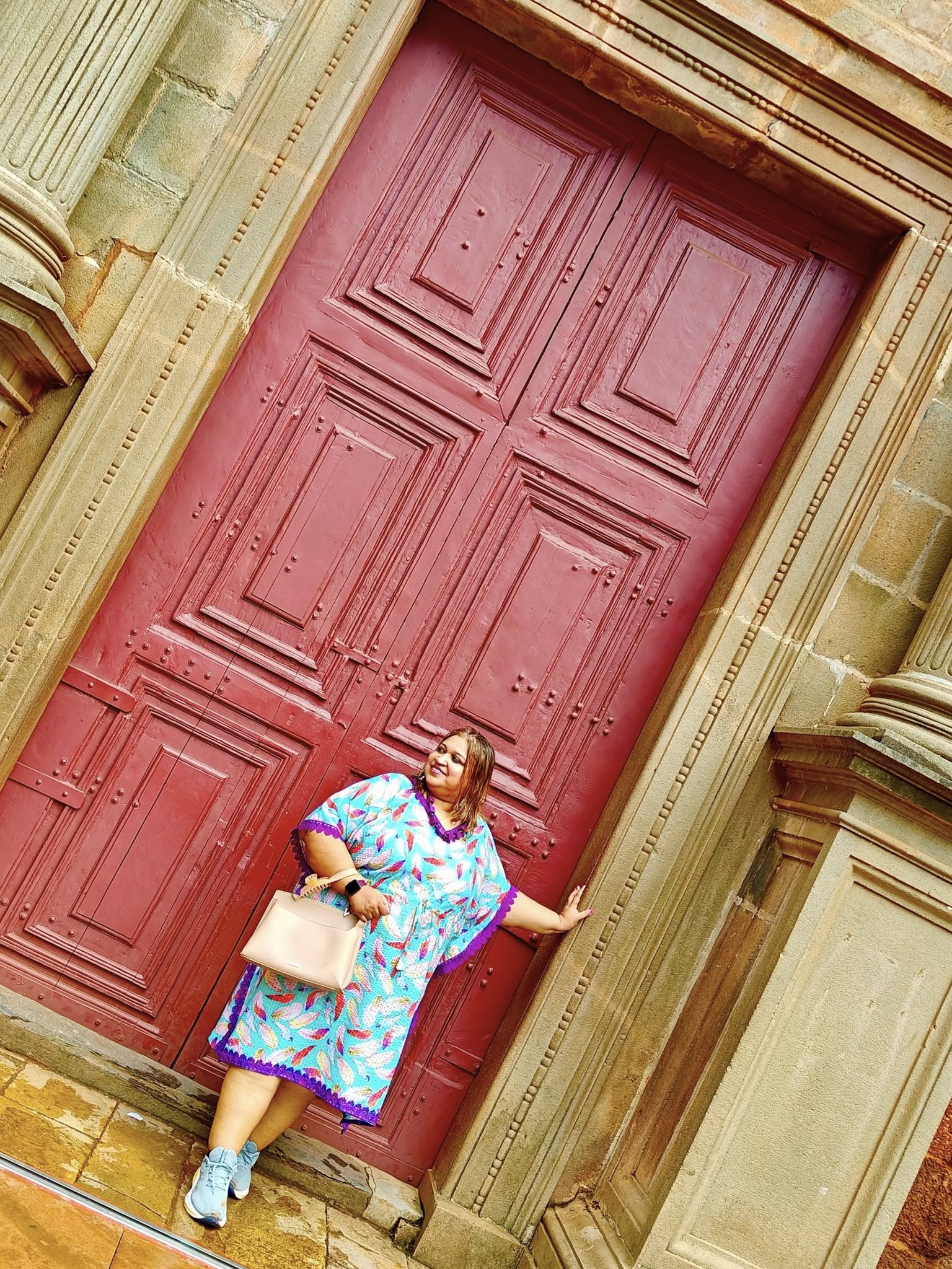 The timeless red laterite facade of the Basilica of Bom Jesus in Old Goa.