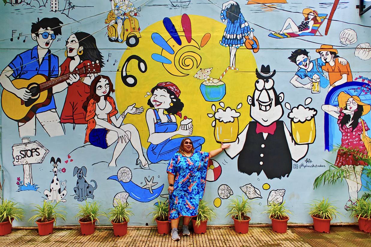 Colorful heritage street in Fontainhas, North Goa, lined with Portuguese-style houses and vibrant facades.