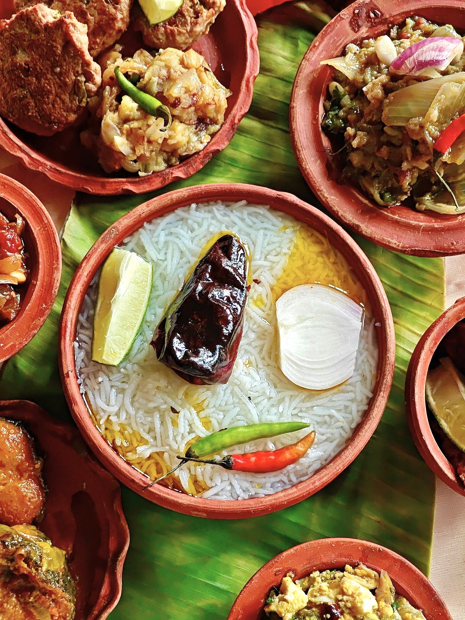 Traditional fermented rice served Bengali-style.