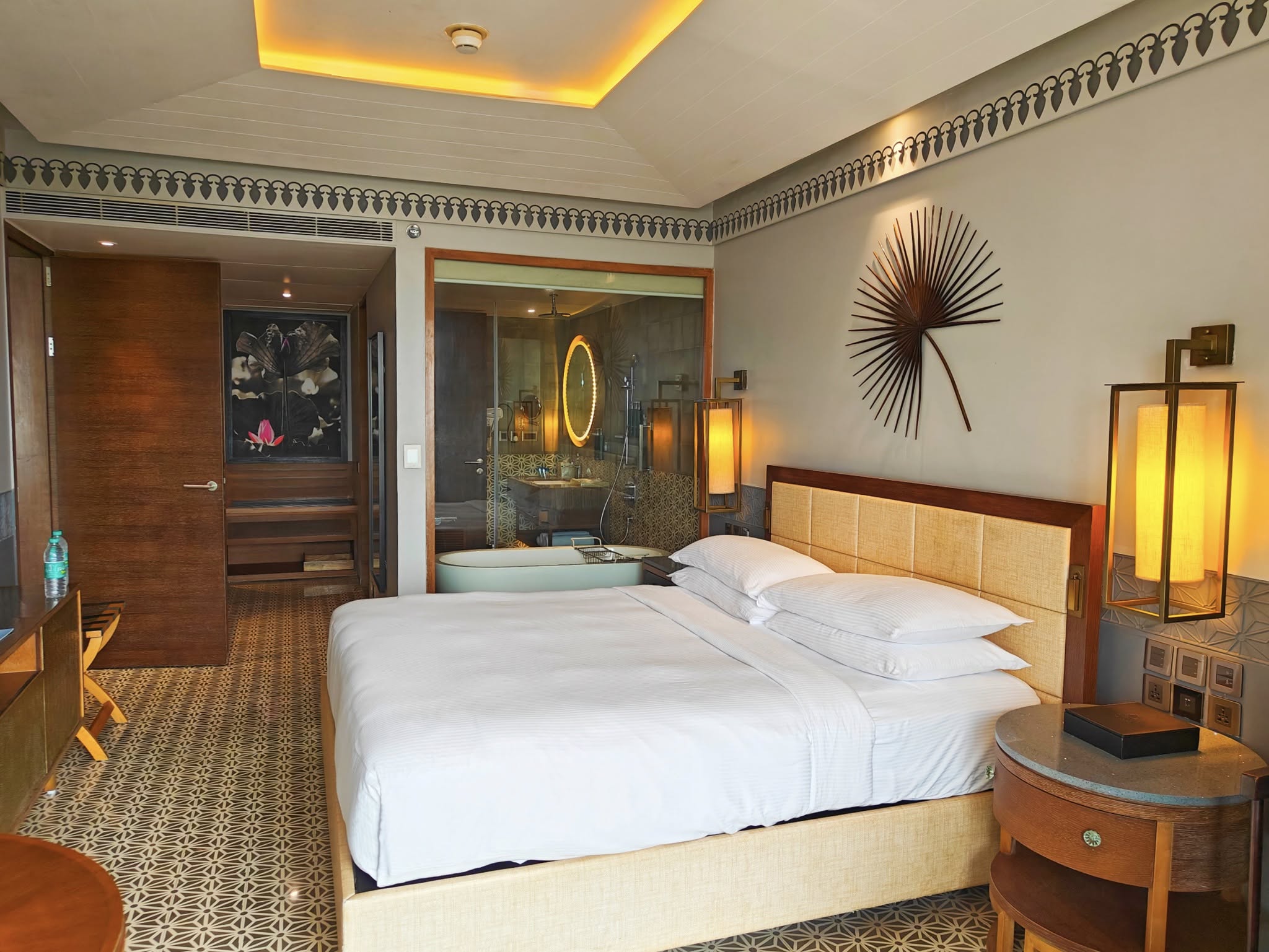 Premium Deluxe River View Suite at DoubleTree by Hilton Goa, featuring stylish interiors and serene river views.
