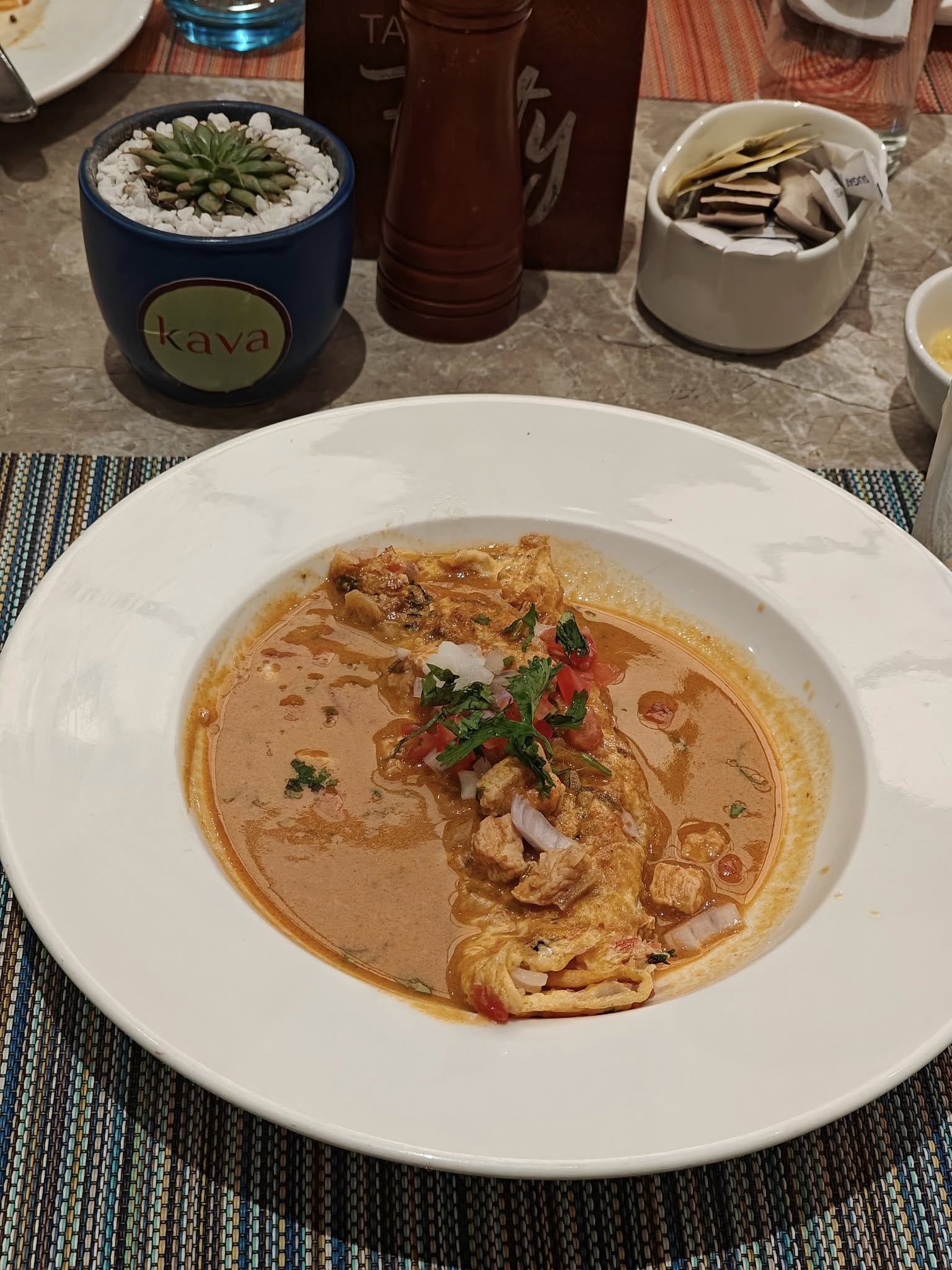 Goan ros omelette โ eggs cooked in a rich coconut curry sauce