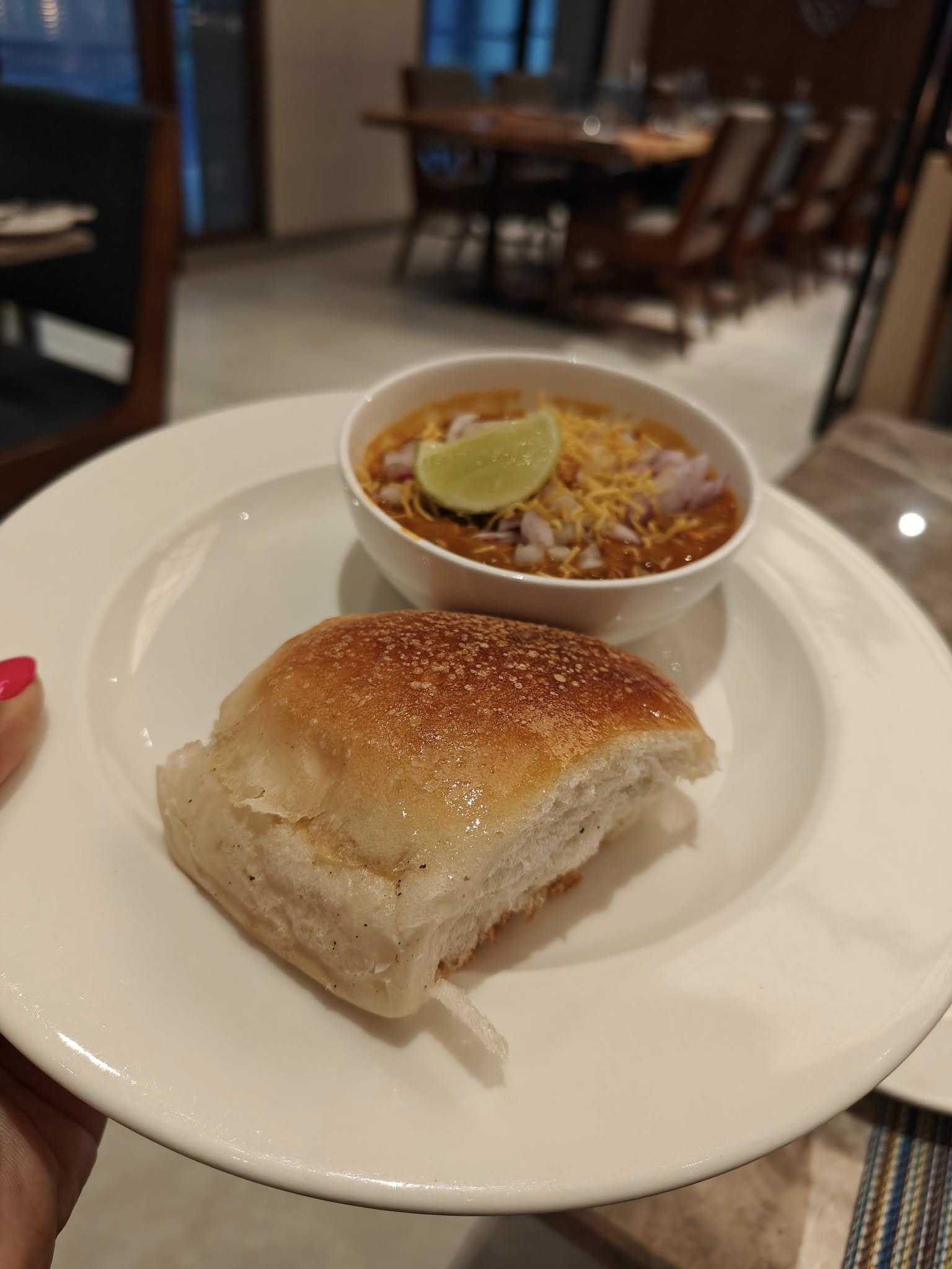 Maharashtra misal pao โ spicy sprouted lentil curry with bread rolls