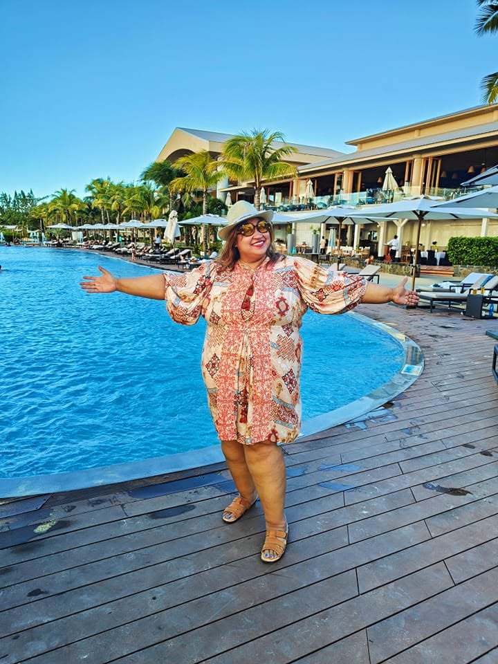 Unwinding by the pool at Le Mรฉridien Mauritius on a sun-drenched afternoon