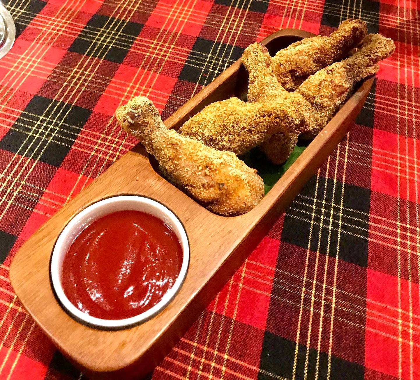 Parsi Chicken Farcha – crispy golden fried chicken pieces served hot.
